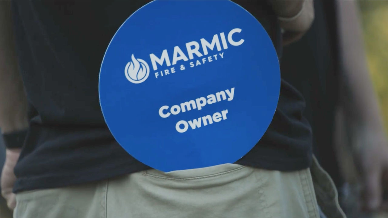 A group of Frontmatec employees gathered for a presentation.