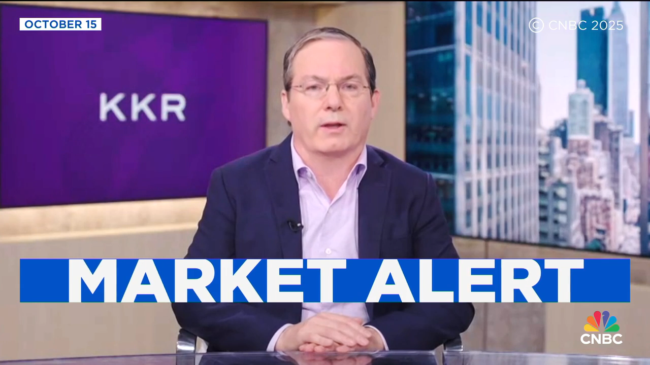 Henry McVey on a television news set for a interview.